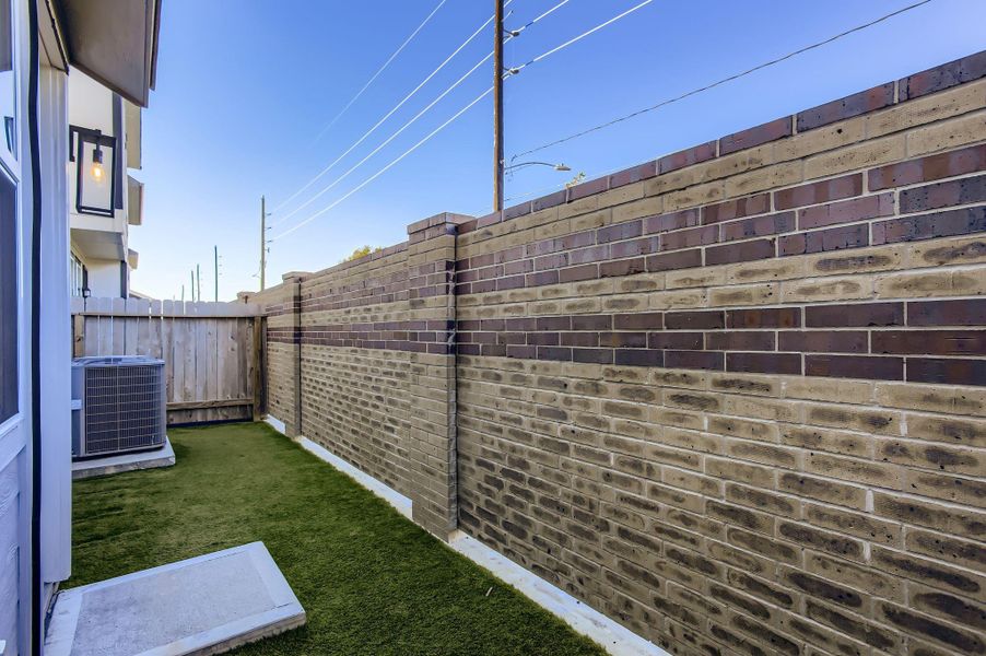 Exterior details and patio area of a home in , Houston (Image 27).