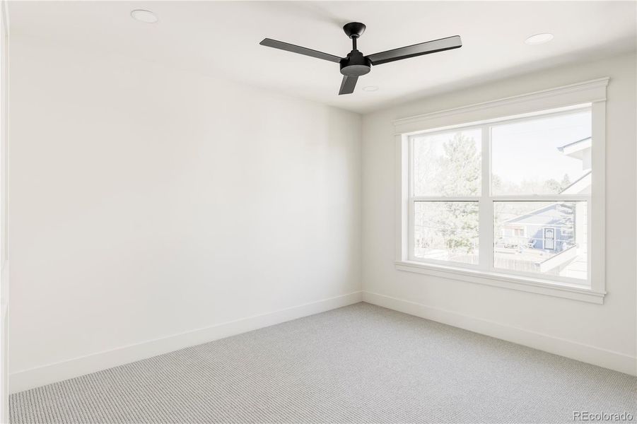 Well-appointed secondary bedrooms with ample natural light