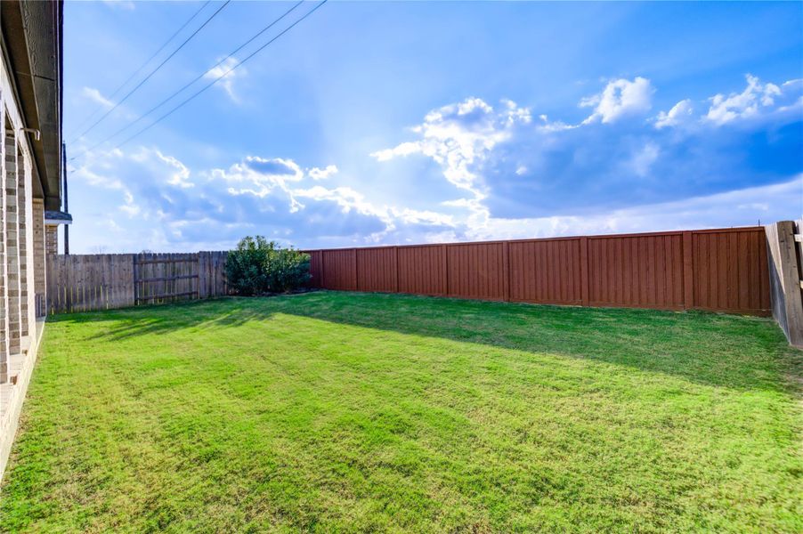 Exterior details and patio area of a home in , Katy (Image 32).