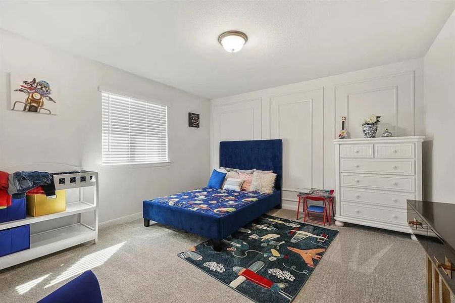 Bedroom featuring carpet floors