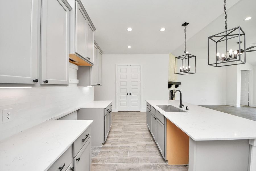 All of this overlooks your expansive family room, creating a perfect space for culinary delights and family gatherings. All of this overlooks your expansive family room, creating a perfect space for culinary delights and family gatherings.