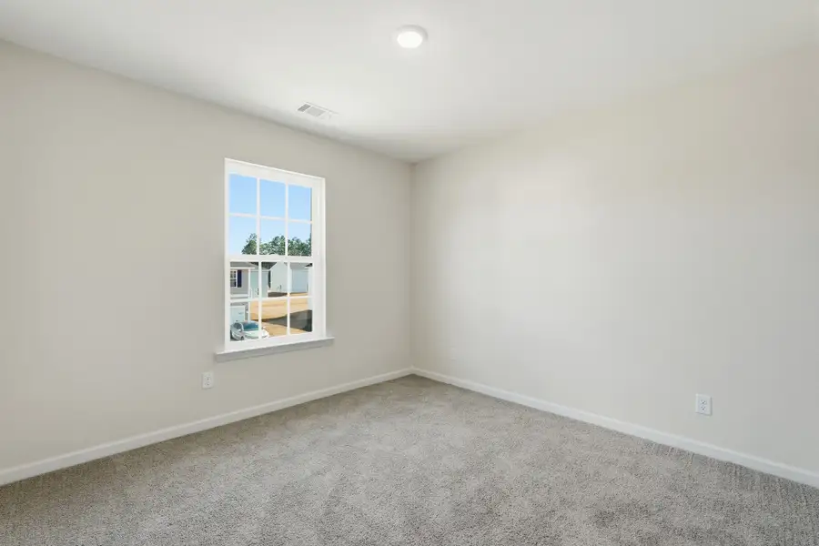 Representative unfurnished interior of a home built from the The Stacy by RTS Homes in Lakeside at Fifteen West, Hinesville (Image 28).