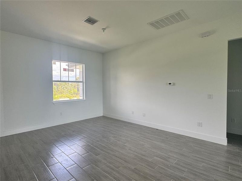 Spacious, unfurnished interior of a new home in , Port Charlotte (Image 17).