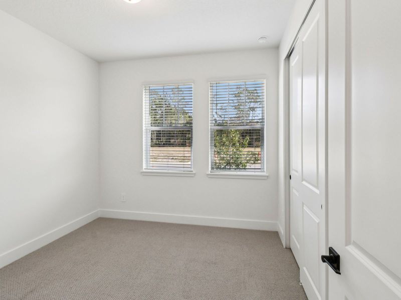 Spacious, unfurnished interior of a new home in Ridgehaven - Signature Series, Ormond Beach (Image 12).