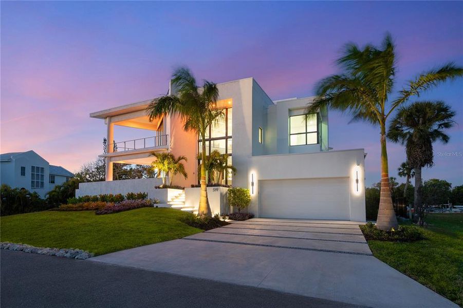 Front exterior of a new home in , Longboat Key, FL, highlighting curb appeal (Image 2).