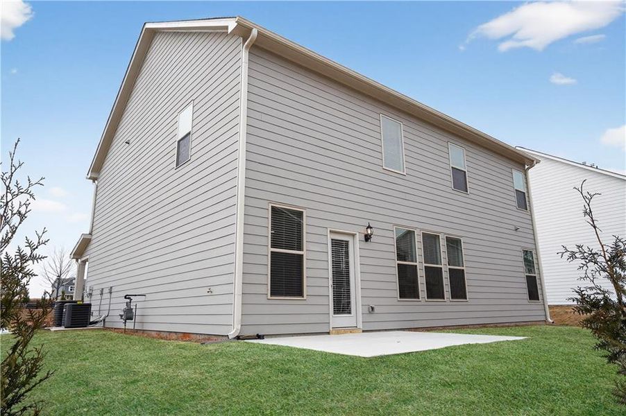Exterior details and patio area of a home in The Fairways at Mirror Lake, Villa Rica (Image 4).
