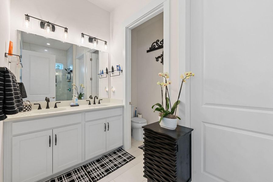 Furnished interior view inside a new home in Summerwind Crossing at Lakes of Cane Bay, Summerville (Image 6).