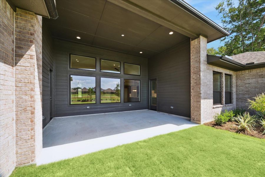 Exterior details and patio area of a home in Artavia, Conroe (Image 4).
