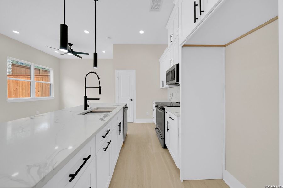 Furnished interior view inside a new home in , San Antonio (Image 3).
