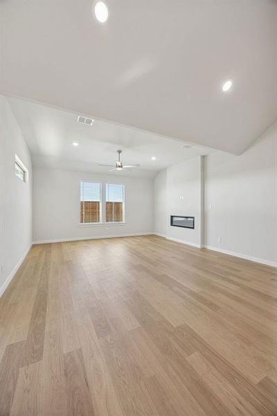 Living Room in the Wimbledon home plan by Trophy Signature Homes – REPRESENTATIVE PHOTO