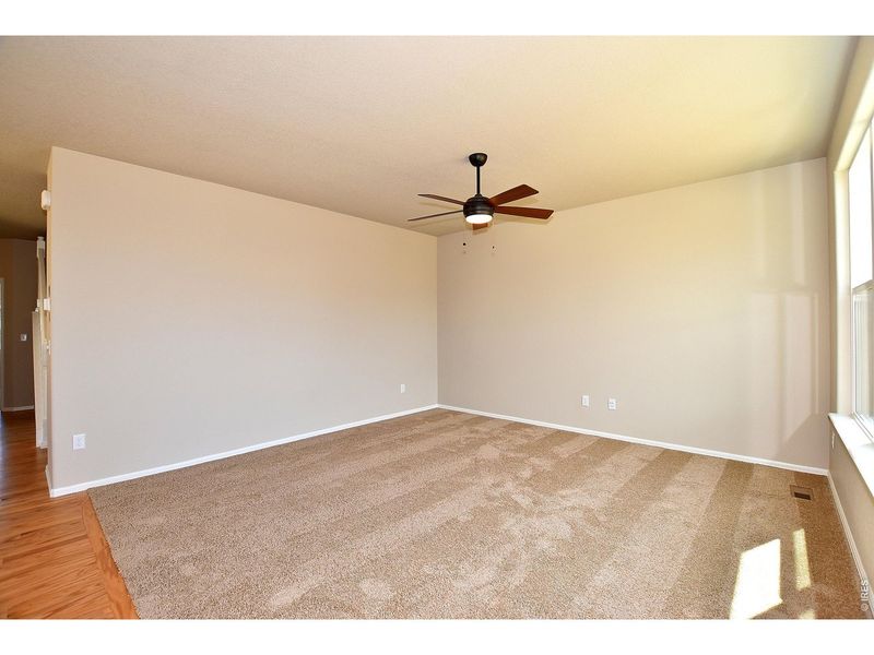 Spacious, unfurnished interior of a new home in Union Colony West, Greeley (Image 25).