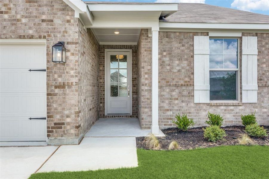 Exterior details and patio area of a home in Reatta Ridge, Justin (Image 3).