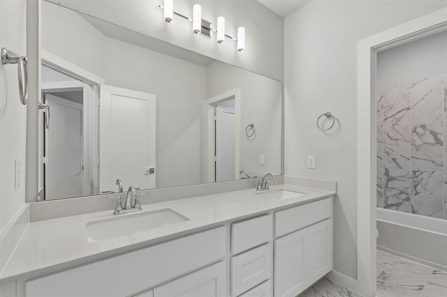 Bathroom in the Winters home plan by Trophy Signature Homes – REPRESENTATIVE PHOTO Bathroom in the Winters home plan by Trophy Signature Homes – REPRESENTATIVE PHOTO