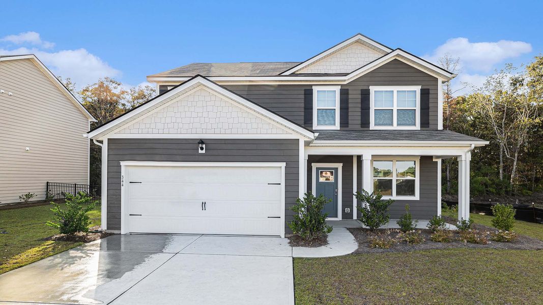Representative exterior photo of a completed home built from the Plan by D.R. Horton in Hemingway Landing, Conway, SC (Image 13). Representative exterior photo of a completed home built from the Plan by D.R. Horton in Hemingway Landing, Conway, SC (Image 13).