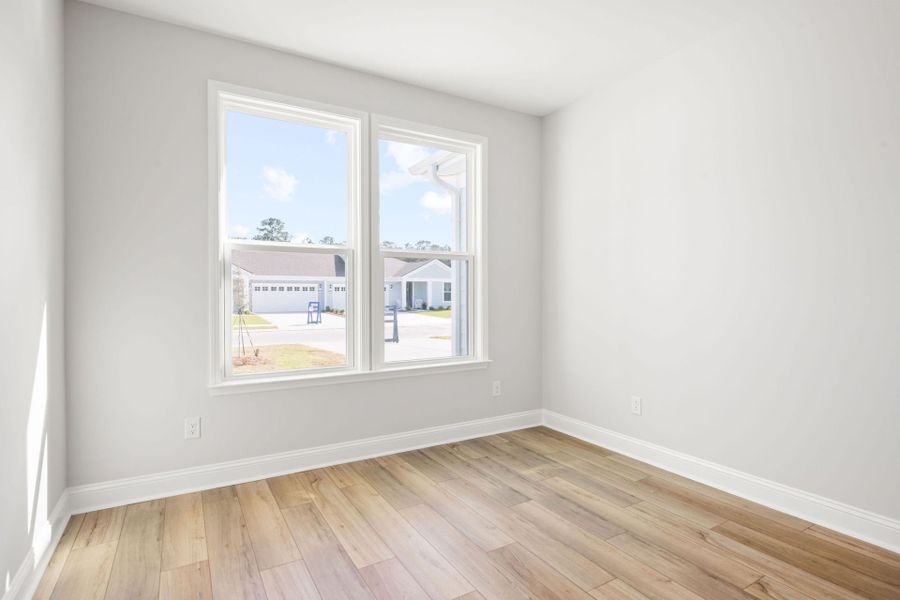 Spacious, unfurnished interior of a new home in Sun City Hilton Head, Bluffton (Image 18).
