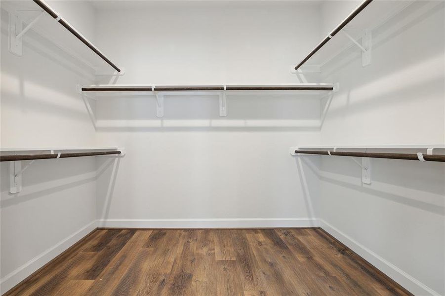 Large walk-in closet that is perfectly designed.