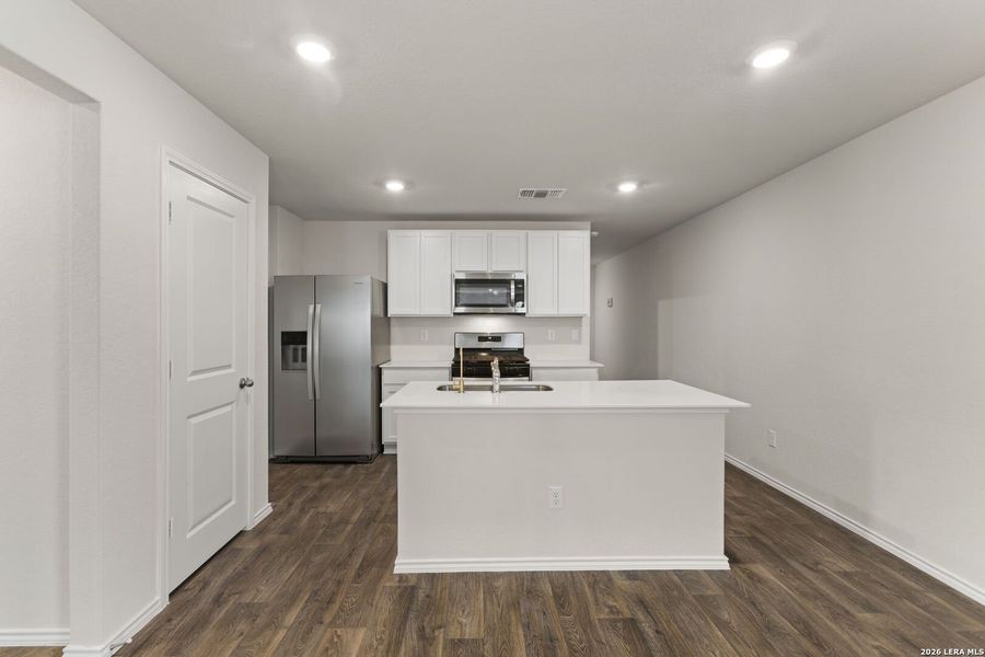 Furnished interior view inside a new home in Redbird Ranch, San Antonio (Image 6).