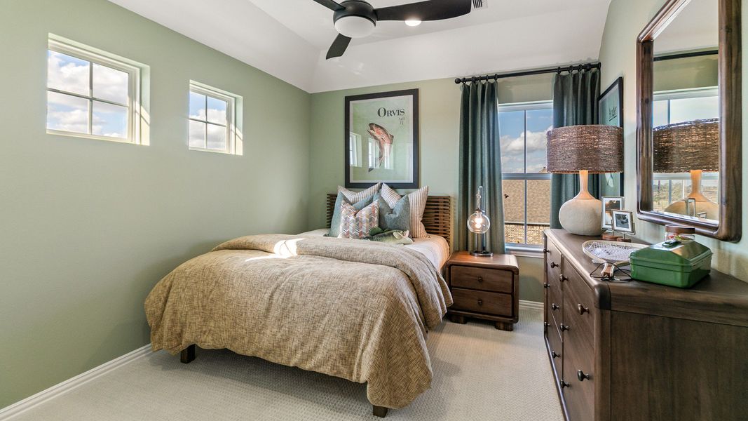 Representative furnished interior of a home built from the Rosewood by Brightland Homes in Sunterra, Katy (Image 22).