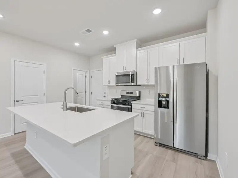 Furnished interior view inside a new home in The Rows at Buffaloe Reserve, Raleigh (Image 3).