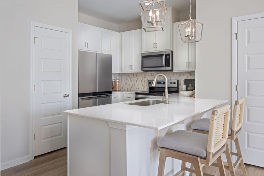 Furnished interior in a model home at Brooks Mill - Edge Series in Durham (Image 4). Furnished interior in a model home at Brooks Mill - Edge Series in Durham (Image 4).