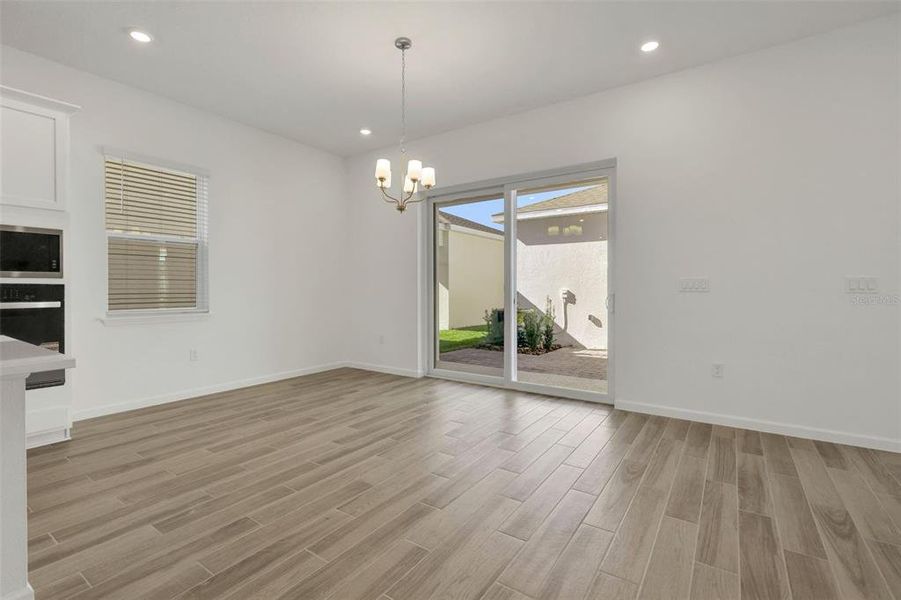 Spacious, unfurnished interior of a new home in Serenade at Ovation, Winter Garden (Image 33).