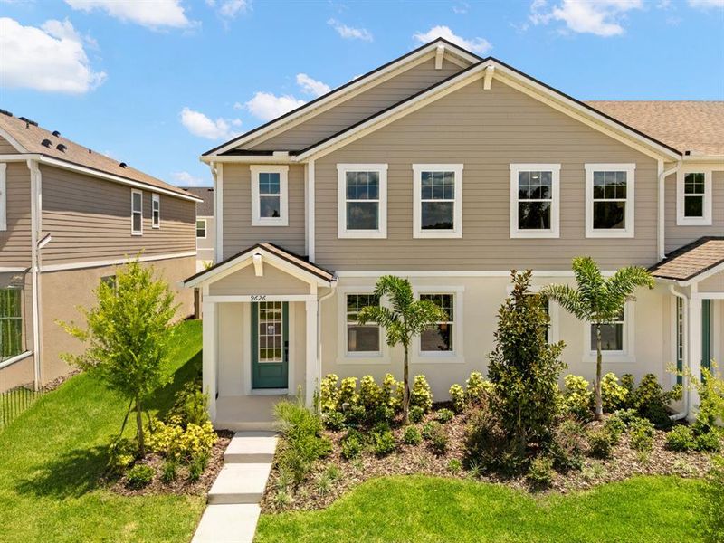 Front exterior of a new home in Meridian Parks, Orlando, FL, highlighting curb appeal (Image 1). Front exterior of a new home in Meridian Parks, Orlando, FL, highlighting curb appeal (Image 1).