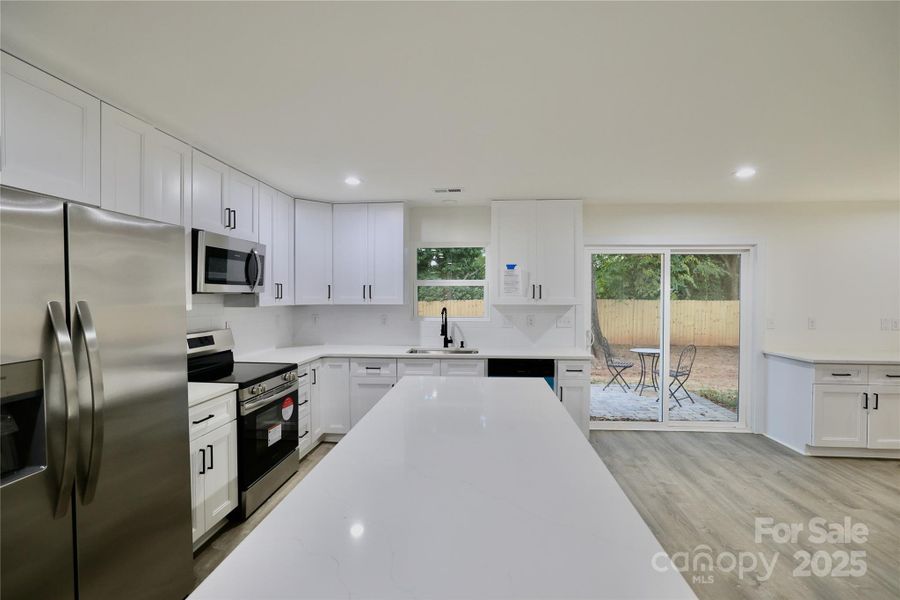 Quartz countertops & soft-close cabinets Quartz countertops & soft-close cabinets