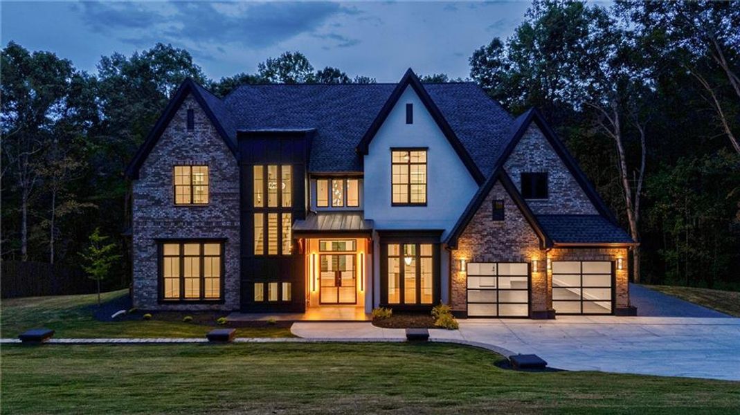 Front exterior of a new home in , Loganville, GA, highlighting curb appeal (Image 2). Front exterior of a new home in , Loganville, GA, highlighting curb appeal (Image 2).