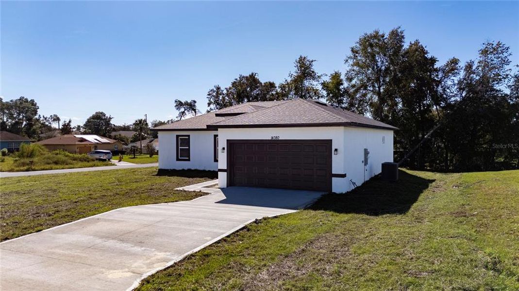 Front exterior of a new home in , Ocala, FL, highlighting curb appeal (Image 17). Front exterior of a new home in , Ocala, FL, highlighting curb appeal (Image 17).