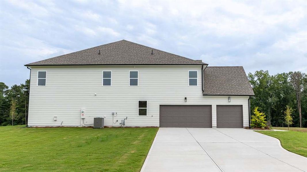 Front exterior of a new home in Holland Estates, Powder Springs, GA, highlighting curb appeal (Image 30).