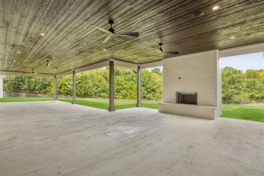 Outdoor living is a dream, with a 50' covered patio and raised-hearth fireplace. Outdoor living is a dream, with a 50' covered patio and raised-hearth fireplace.