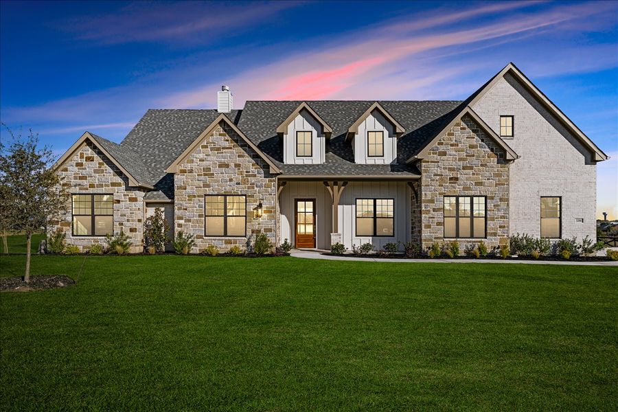 Front exterior of a new home in Stardust Ranch, Northlake, TX, highlighting curb appeal (Image 31). Front exterior of a new home in Stardust Ranch, Northlake, TX, highlighting curb appeal (Image 31).