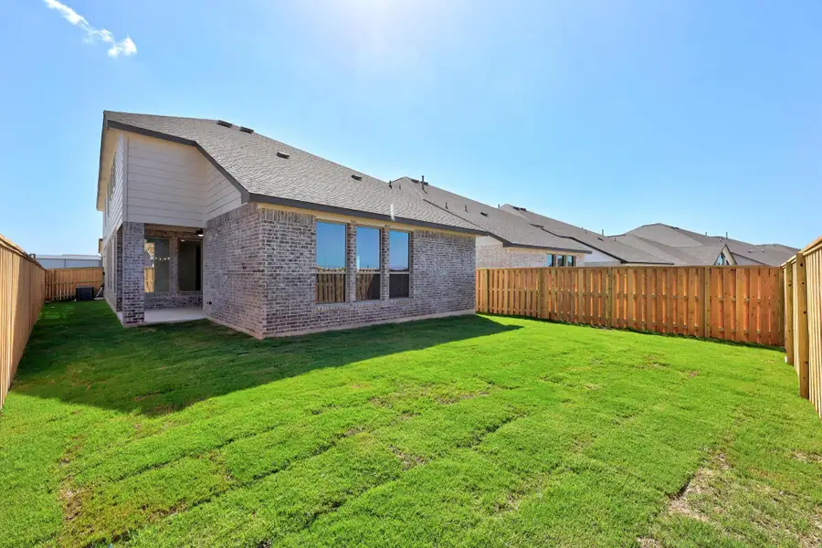 Exterior details and patio area of a home in Parmer Ranch - 40', Georgetown (Image 3).
