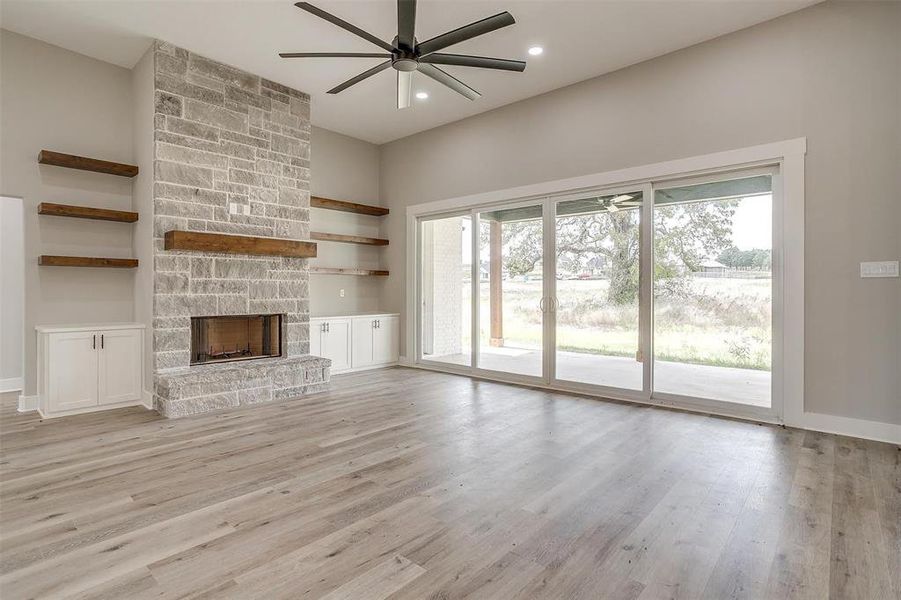 Sliding glass doors, built in cabinets and shelving.