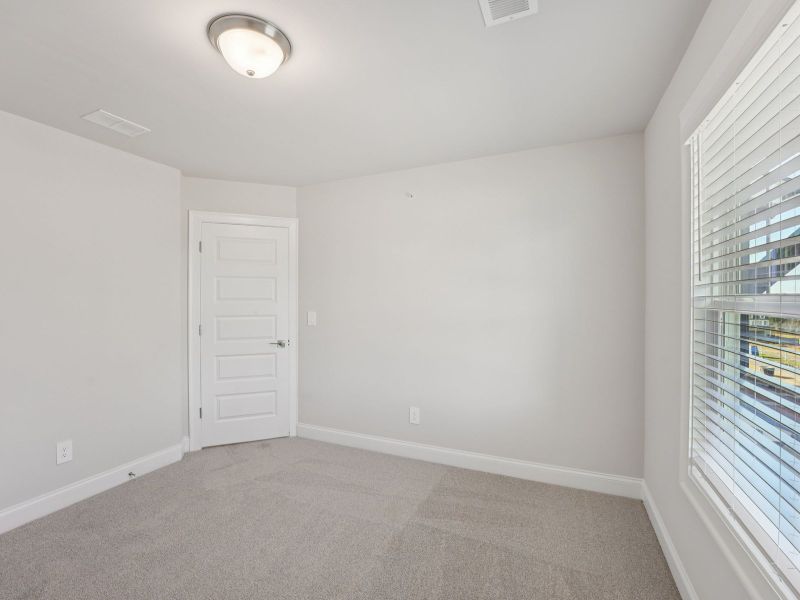 Spacious, unfurnished interior of a new home in Hemingway - Highland Series, Cumming (Image 19).
