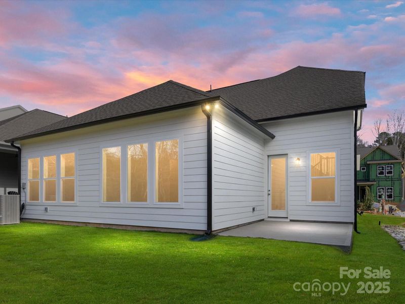 Exterior details and patio area of a home in North Creek Village, Huntersville (Image 3).