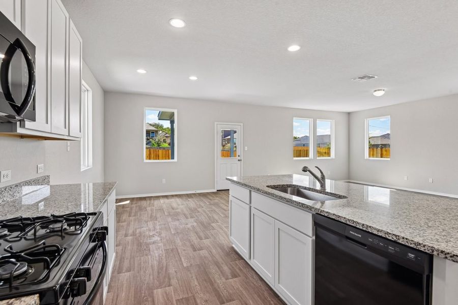Furnished interior view inside a new home in Hunters Ranch, San Antonio (Image 9).