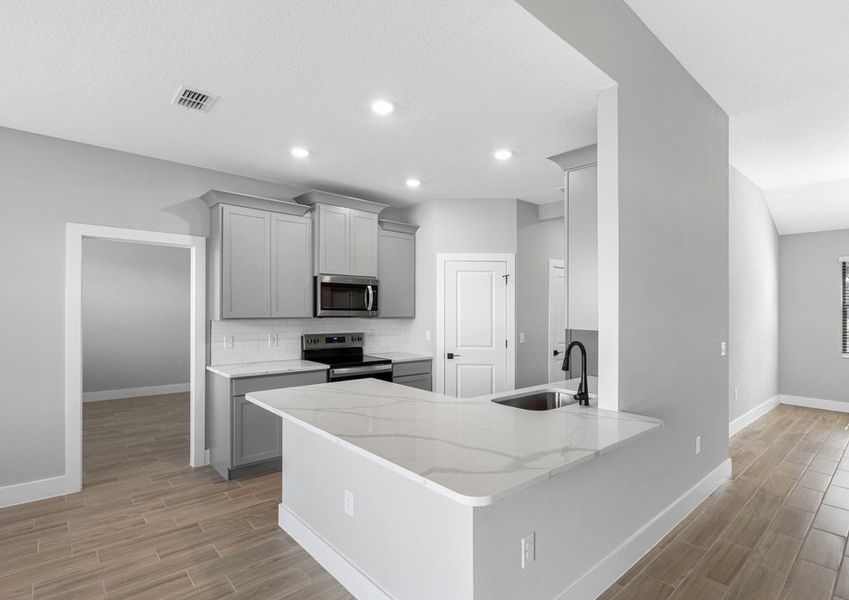 Never miss a moment in this gorgeous kitchen