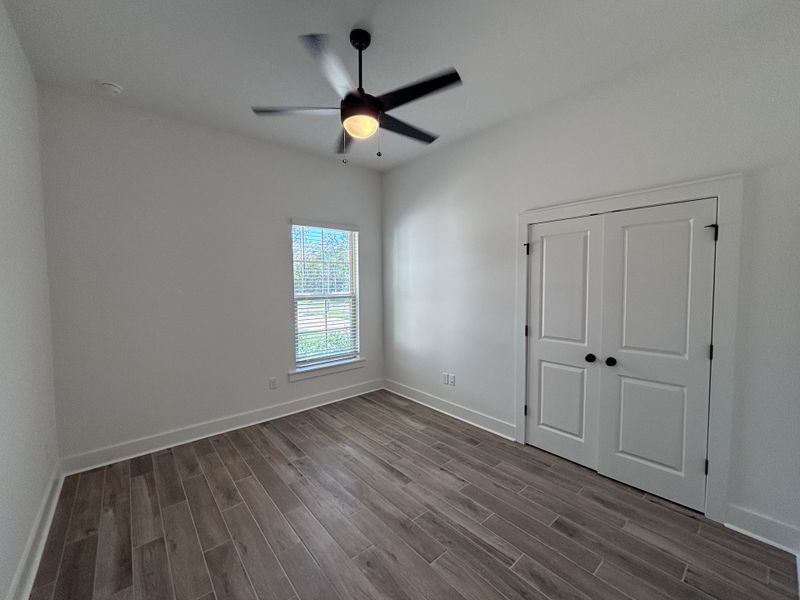 Spacious, unfurnished interior of a new home in Bird Song at Hammock Bay, Freeport (Image 23).