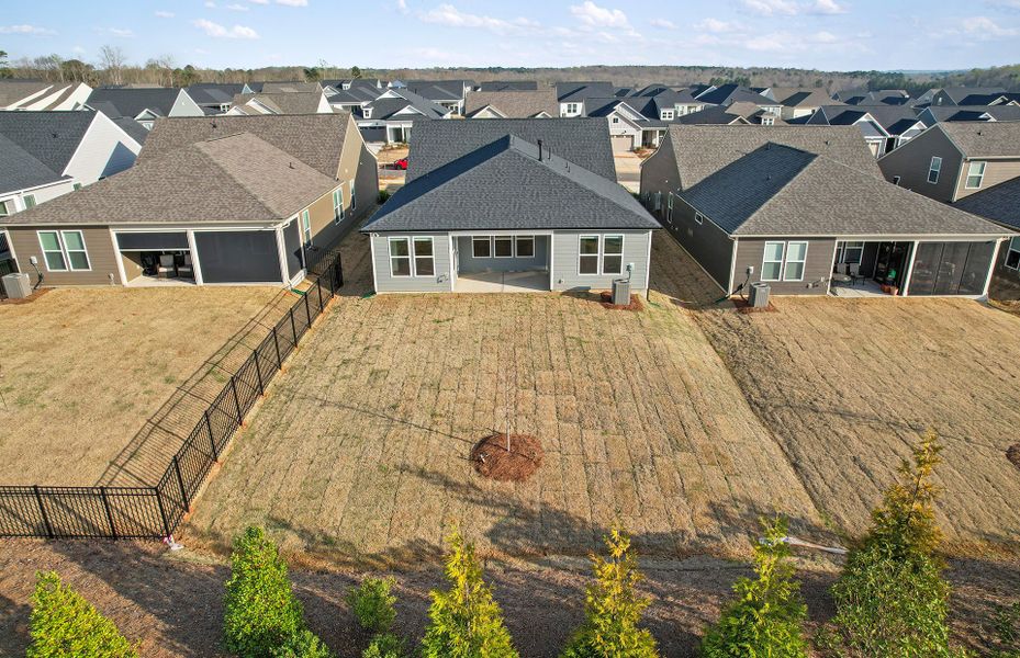 Exterior details and patio area of a home in Carolina Riverside, Belmont (Image 3).