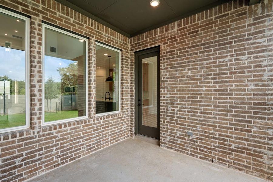 Exterior details and patio area of a home in Wolf Ranch, Georgetown (Image 24). Exterior details and patio area of a home in Wolf Ranch, Georgetown (Image 24).