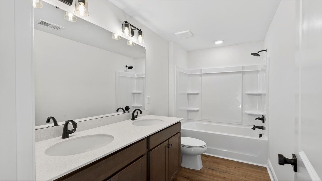 Furnished interior view inside a new home in Creekside at Andrews, Summerville (Image 12).