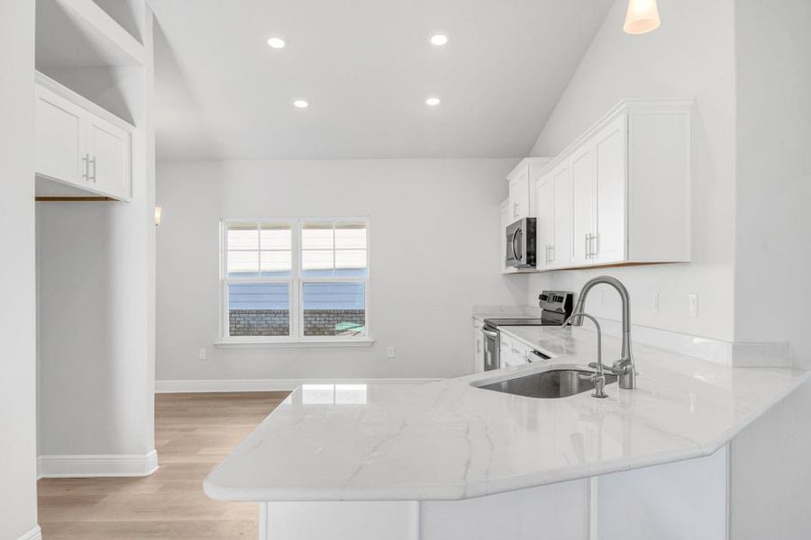 Furnished interior view inside a new home in The Bluffs at Lafayette, Freeport (Image 5).