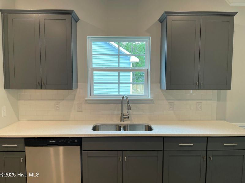 Furnished interior view inside a new home in Mill Creek Cove, Bolivia (Image 4).