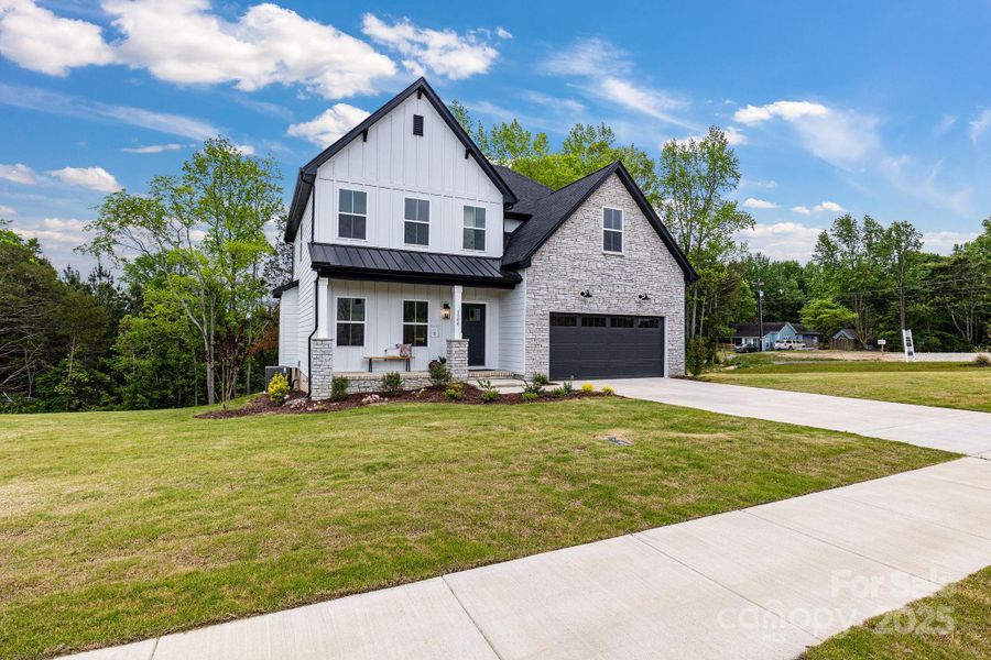 Front exterior of a new home in , Kannapolis, NC, highlighting curb appeal (Image 2).