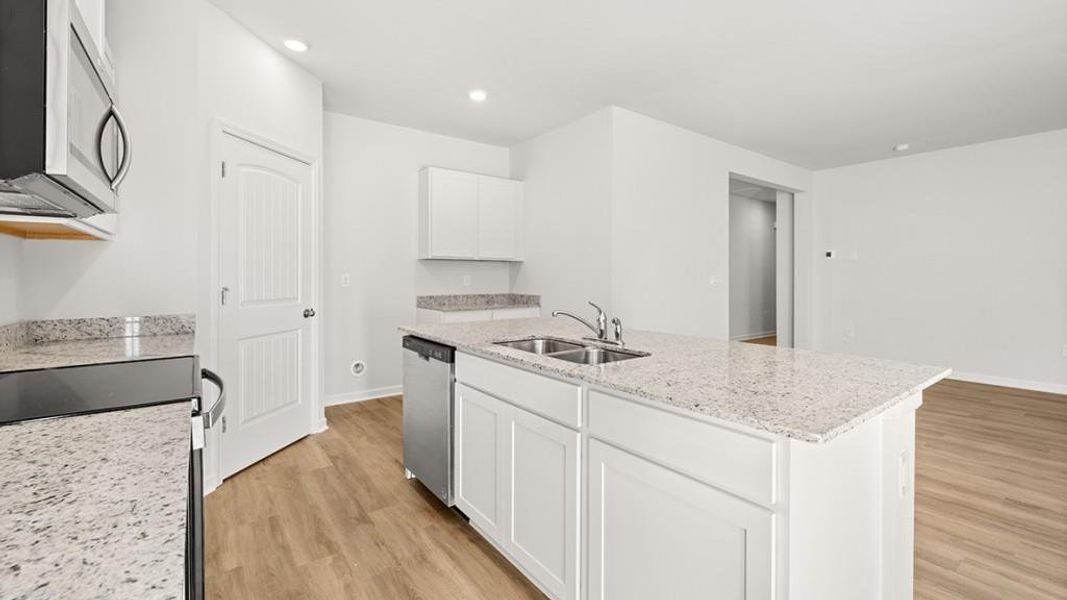 Furnished interior view inside a new home in Rolling Meadows, Jasper (Image 6). Furnished interior view inside a new home in Rolling Meadows, Jasper (Image 6).