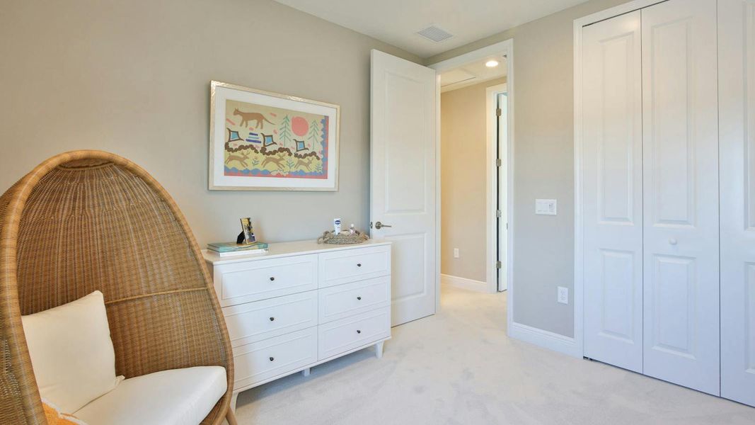 Furnished interior view inside a new home in Grand Park Real Estate and Homes for Sale in Sarasota, FL - Neal Communities, Sarasota (Image 20).