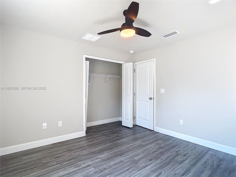 Spacious, unfurnished interior of a new home in , Port Charlotte (Image 9).