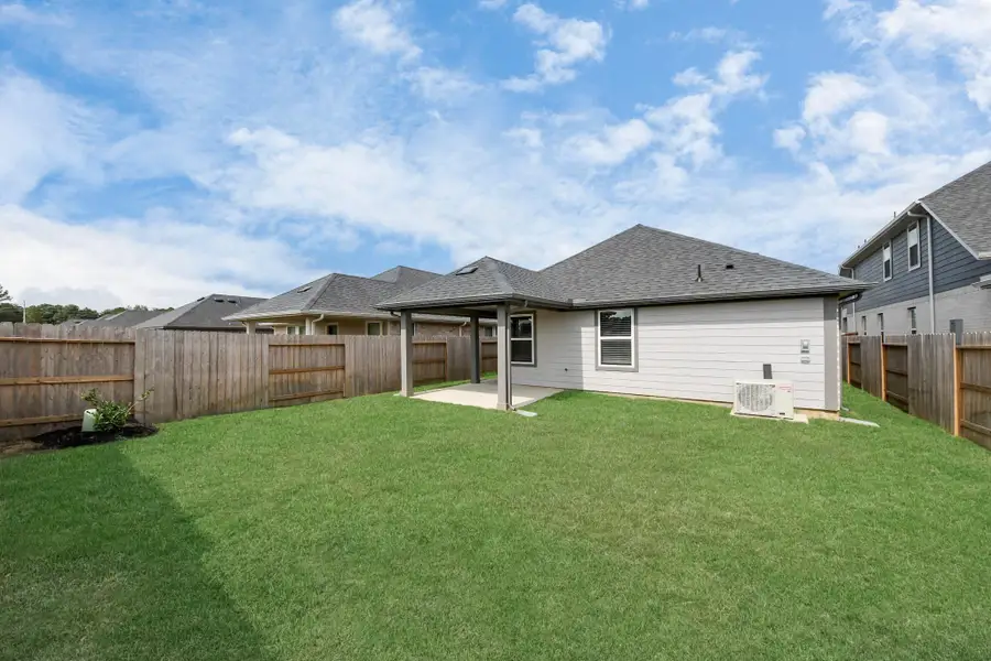 Exterior details and patio area of a home in Sorella: Signature Collection, Tomball (Image 2).