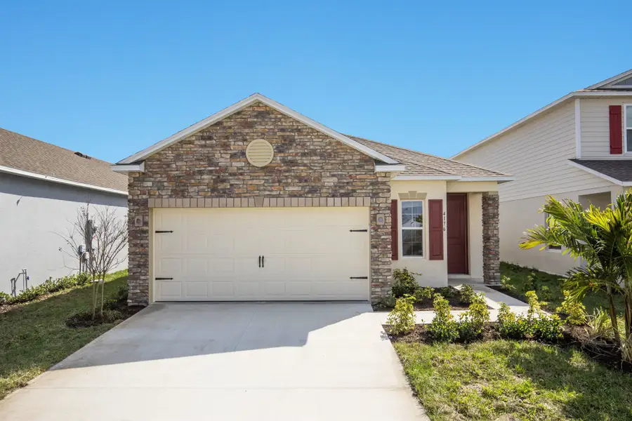 Representative exterior photo of a completed home built from the Victoria by Maronda Homes in Crosswinds, Haines City, FL (Image 15).